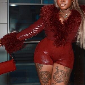 Chic Red Faux Fur Trimmed Outfit with Matching Bag